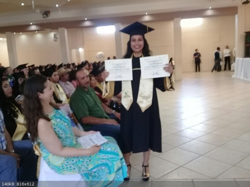 Michelle with honor  certificates.jpg - 140kB