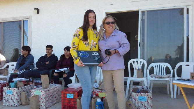 Lizeth with her donated computerx.jpg - 50kB